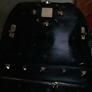 MCM brand new black and gold book bag turned into